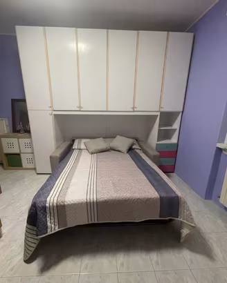 Camera singola con bagno privato e angolo cottura