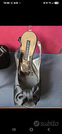 Scarpe aperte con tacco alto
