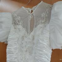 Abito sposa fatto a mano in atelier, velo e guanti