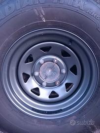 CERCHI SCAMPANATI DA 15 (6 fori)+ GOMME 4 STAGIONI