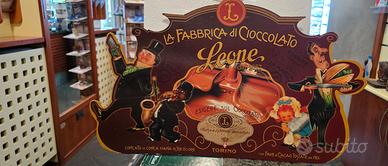 cartello pubblicitario vintage in cartone
