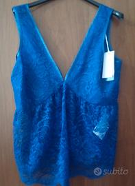 Top scollato