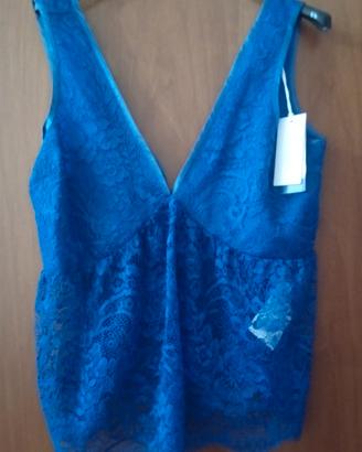 Top scollato