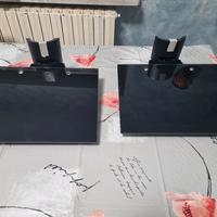 Piani in vetro con passacavi per accessori TV.
