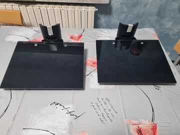 Piani in vetro con passacavi per accessori TV.