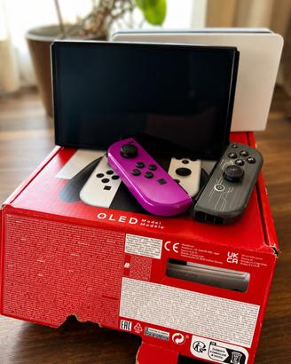 Nintendo Switch OLED + Joy-Con + scatola originale
