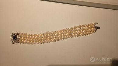 Bracciale perle con fermaglio in oro.