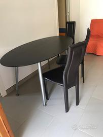 Tavolo ellittico 150/60 con 6 sedie colore nero