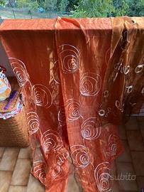 tende in voile polyestere doppio velo  con  asole