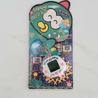 Tamagotchi Rakuraku Dinokun bianco rarissimo nuovo