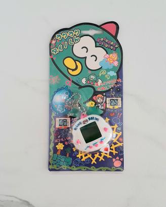 Tamagotchi Rakuraku Dinokun bianco rarissimo nuovo