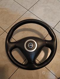 volante punto Sporting 