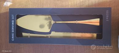 paletta e coltello color oro 