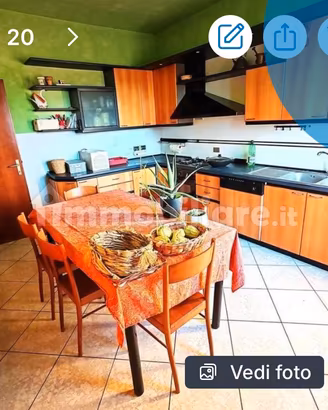 Cucina angolare in legno ciliegio opaco