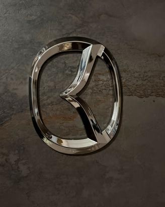 Mazda vehicle badge