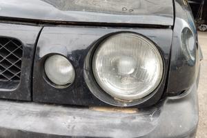 Proiettore sinistro NISSAN TERRANO II del 1997