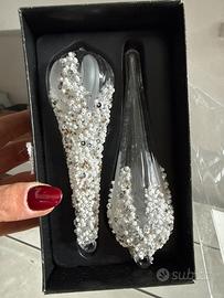 Otto palline in vetro a forma di goccia