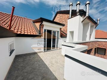 Appartamento mansardato con terrazzino