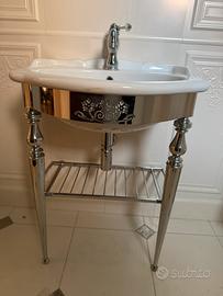 Lavabo in finissima ceramica e struttura cromata