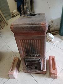 Stufa antica in cotto da arredo 