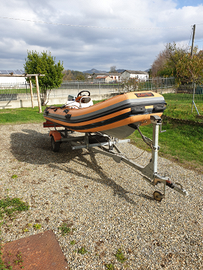 Gommone, carrello stradale e motore