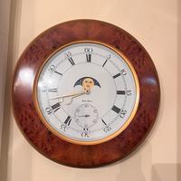 Orologio da parete in radica di noce