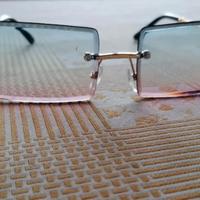 Occhiali da sole rettangolari senza montatura