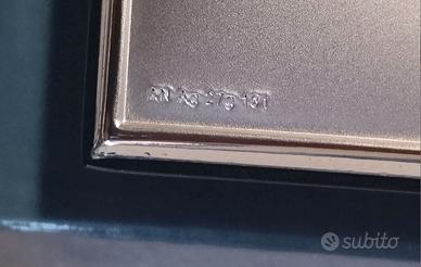 Grande cornice con specchio in lamina di argento