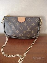 Pochette Louis Vuitton in Tela 