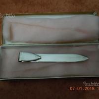 Tagliacarte anello e spilla in argento