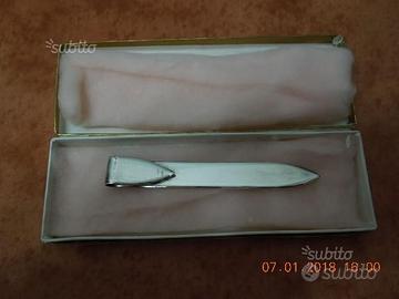 Tagliacarte anello e spilla in argento