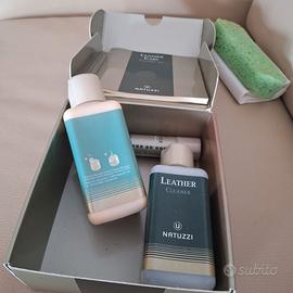 Divano in pelle con due poltrone