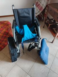 carrozzina x disabili +cuscini antidecupido 