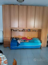 camera, cucina e cameretta 