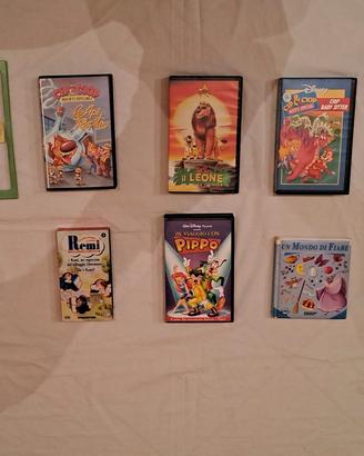 Videocassette cartoni animati, libri, cartine geog
