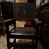 Poltrona in pelle stile antico