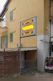 Insegna luminosa bifacciale