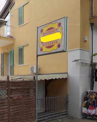 Insegna luminosa bifacciale