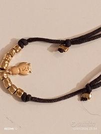 Dodo Gufetto e 8 granelli il tutto oro 18 kt