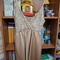 Tuta oro con paillettes 