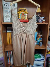 Tuta oro con paillettes 