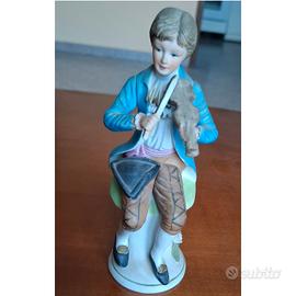 Statua bambino con violino Capodimonte