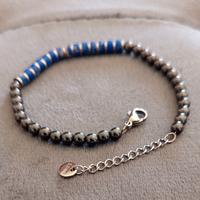 Bracciale con perline in ematite chiusura acciaio 