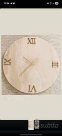 Orologio in marmo con rifiniture in bronzo