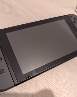 Nintendo Switch 1 + controller e custodia 