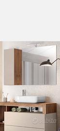 Specchio con mobiletto integrato e luce
