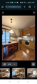 Cucina in legno con piano in granito