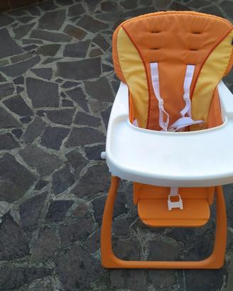 seggiolone arancio portatile