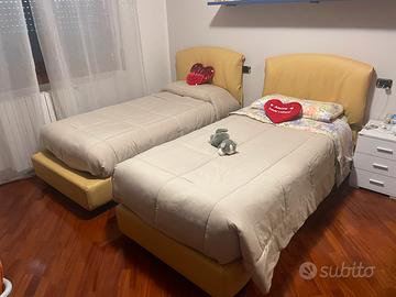 Letto singolo rivestito in pelle e rete a doghe