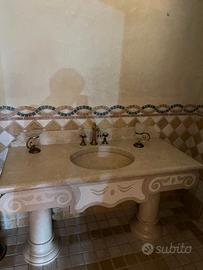 LAVABO IN PIETRA SCOLPITO A MANO